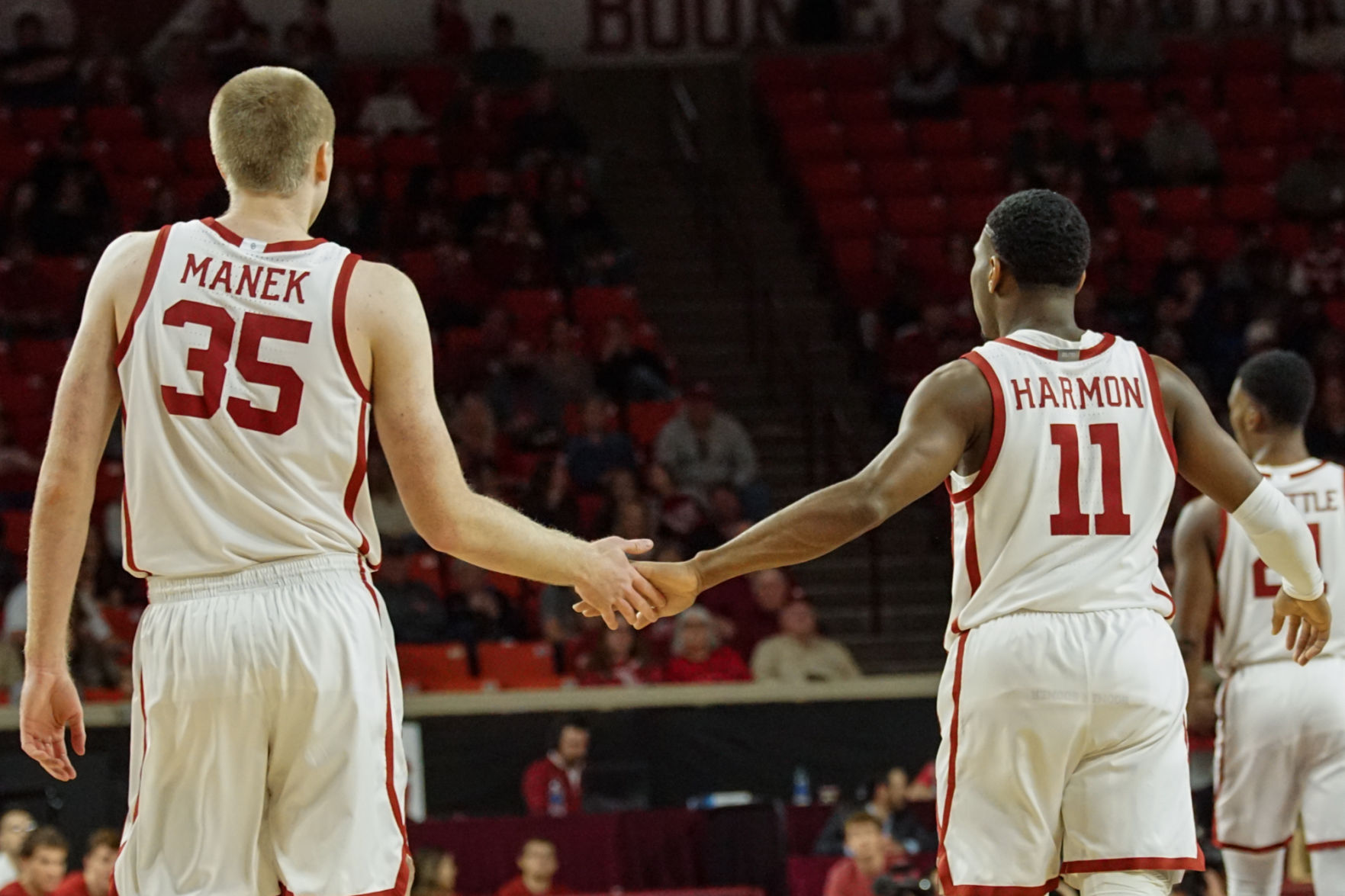 Brady Manek and De'Vion Harmon high five